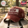 Distressed dark red baseball cap with embroidered Rush The Spirit Of Radio patch and starman logo on outdoor wood bench!