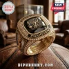 Gold San Antonio Spurs 2026 Western Conference championship ring with diamonds and black gemstone on a basketball!