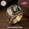 Gold San Antonio Spurs 2026 Western Conference championship ring with rhinestones and black inlay on wood background!
