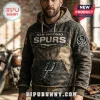 Distressed grey and tan San Antonio Spurs hoodie with vintage patches and logo text for basketball fans!