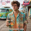 Scooby Doo button down shirt with teal and orange tropical print featuring Scooby Doo graphics and Mystery Surf Club text!