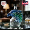 Blue and green eagle head shaped glass liquor decanter on a marble table!