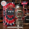 Yeti tumbler with Slayer band logo, electric guitar graphics, and red and black tie-dye box in a library setting!