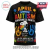 Black t-shirt featuring Snoopy, colorful puzzle pieces, handprints, and text about Autism Awareness Month.!