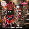 Red black white orange tie-dye Rolling Stones YETI Limited Edition tumbler, vintage rock guitar mechanical design, text 'IT'S ONLY ROCK 'N ROLL BUT I LIKE IT'!