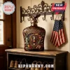 Decorative USA 250th anniversary whiskey bottle with eagle statue and patriotic emblems on a wooden entryway shelf!