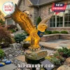 Solar garden eagle statue with yellow glow, blue neck bandana, and Eagles 40th Anniversary 1986-2026 text on rock base!