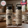 Tan water bottle with black lid, black Newfoundland dog wearing cowboy hat, text 