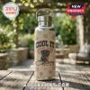 Tan water bottle with brown paw prints. Design shows a black dog in a cowboy hat and text 