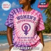 Purple and pink tie-dye t-shirt with Women's Empowerment text and a fist inside a female gender symbol graphic!