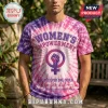 Purple and pink tie-dye t-shirt with Women's Empowerment text and a female symbol with a raised fist graphic design!