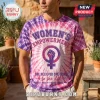 Purple and pink tie-dye t-shirt with Women's Empowerment text and a female symbol with a raised fist graphic design!