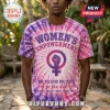 Purple and pink tie-dye t-shirt with Women's Empowerment text and a female symbol with a raised fist graphic design!