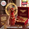 Red and gold Wonder Woman premium collector's fan with logo, 'WONDER WOMAN', 'EST. 1941', 'IN A WORLD OF ORDINARY MORTALS, YOU ARE A WONDER!' text!