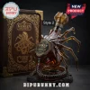 A professional product photograph of a detailed Alien facehugger shaped decanter with a large intricate metal crown stopper next to an ornate wooden storage box against a dark background!