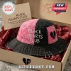 Two-tone distressed pink and black bucket hat with white 'BLACK HEARTS CLUB' text, black broken heart patch, silver safety pins!