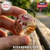 Gold Oklahoma Sooners 2026 NCAA Division I Baseball Champions ring with red gemstones and pave-set diamonds.!