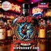 AC/DC 50th anniversary whiskey bottle featuring Angus Young playing guitar, lightning graphics, and black glass finish.!