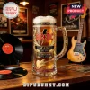AC/DC 53rd anniversary beer mug with gold guitar emblem, band logo, and For Those About To Rock text on wooden bar top.!