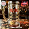 AC/DC glass beer mug with gold filigree handle, band logo, electric guitar graphic, and 53rd anniversary text.!