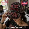 Black baseball cap featuring red AC/DC High Voltage embroidery, rhinestones, metallic studs, and band logo patches.!