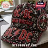 AC/DC black baseball cap adorned with red crystals, silver metal lightning bolts, guitar charms, and embroidered text.!