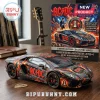AC/DC Lamborghini Aventador LP700-4 diecast car model with lightning graphics and band logo on a wooden desk.!