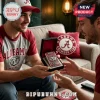 Metal Zippo lighter with Alabama Crimson Tide graphics in a black velvet display case held by two men.!