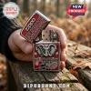 Zippo Alabama Crimson Tide lighter with elephant emblem, stadium graphic, and red textured finish held in a hand.!
