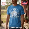 Bright blue cotton t-shirt featuring a white graphic of Alan Jackson playing acoustic guitar within a rope circle border.!