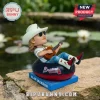 Alan Jackson bobblehead wearing a Braves hat and sunglasses, playing guitar while floating in a Braves branded inner tube.!