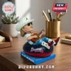 Alan Jackson bobblehead wearing a Braves hat and sunglasses, playing guitar while sitting on a Braves team inner tube.!