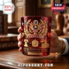 Red glass whiskey tumbler featuring gold emblem of American eagle, Liberty Bell, Independence Hall, and America 250 text.!