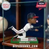 Andruw Jones bobblehead figurine diving to catch a baseball, wearing Atlanta Braves uniform with pink bubble gum bubble.!