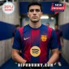 FC Barcelona soccer player wearing blue and red striped jersey with Spotify logo and Nike swoosh in stadium tunnel.!