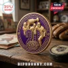 Los Angeles Kings 20th anniversary gold and purple commemorative coin featuring hockey players and a championship trophy.!