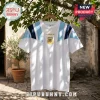 White Adidas Argentina national football team jersey with light blue and dark blue shoulder panels and gold AFA logo.!