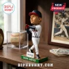 David Justice Atlanta Braves resin bobblehead wearing home white uniform standing on a green base on a wooden desk.!