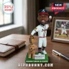 Atlanta Braves baseball player bobblehead with a golden doodle dog on a green base labeled Money Mike and Cash.!