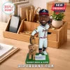 Custom Atlanta Braves baseball player bobblehead with a golden retriever puppy on a green base labeled Money Mike & Cash.!