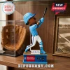 Ronald Acuña Jr. baseball bobblehead wearing a light blue uniform with a functional home run tracker on a wooden shelf.!