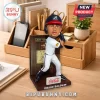 Drake Baldwin Atlanta Braves bobblehead standing on a brown wooden base with a Coca-Cola logo on a desk.!