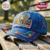 Distressed blue denim baseball cap with embroidered colorful hands, puzzle piece patterns, and autism awareness text.!