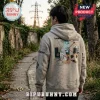 Beabadoobee Pylon graphic hoodie in beige featuring red string art, collage prints, and text on an outdoor path.!