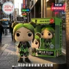 Billie Eilish vinyl collectible figure in a green flame shirt next to its matching branded packaging box on a city street.!