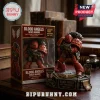 Blood Angels Space Marine 40th anniversary vinyl figure with box on a desk next to books and an inkwell.!