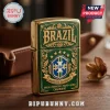 Gold-trimmed green metal lighter featuring the Brazil national football team crest and text.!