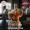 Buffalo Trace whiskey bottle shaped like a sculpted bison with mountain etching, sitting on a clear glass rock base.!