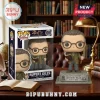Rupert Giles Funko Pop figure holding a book and stake, standing on a memorial base with a library background.!