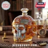 Call of Duty 23rd Anniversary amber glass skull decanter with helmet and diamond stopper on a wooden desk with bullet casings.!